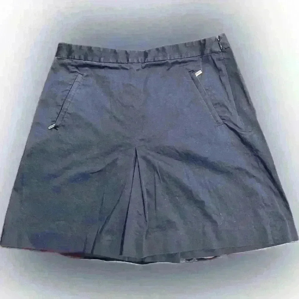 Ralph Lauren Golf navy, mid-thigh, pleated shorts with gold zipper details